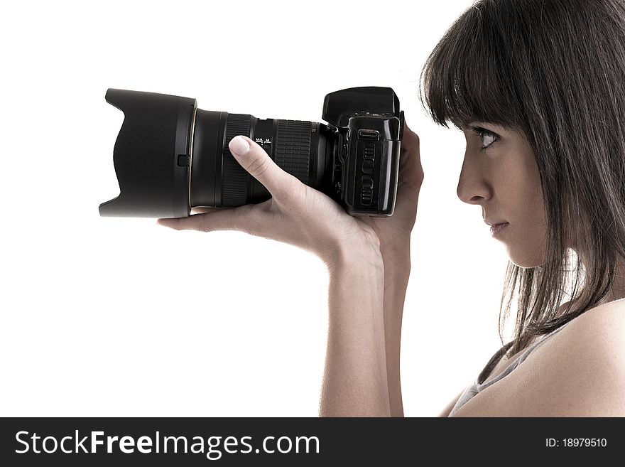 Young woman holding a hoto camera. Young woman holding a hoto camera