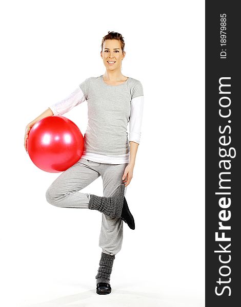 Girl holding a red ball, on a white background. Girl holding a red ball, on a white background