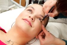 Applying Makeup To A Model Royalty Free Stock Images Applying Makeup To A Model Royalty Free Stock Images