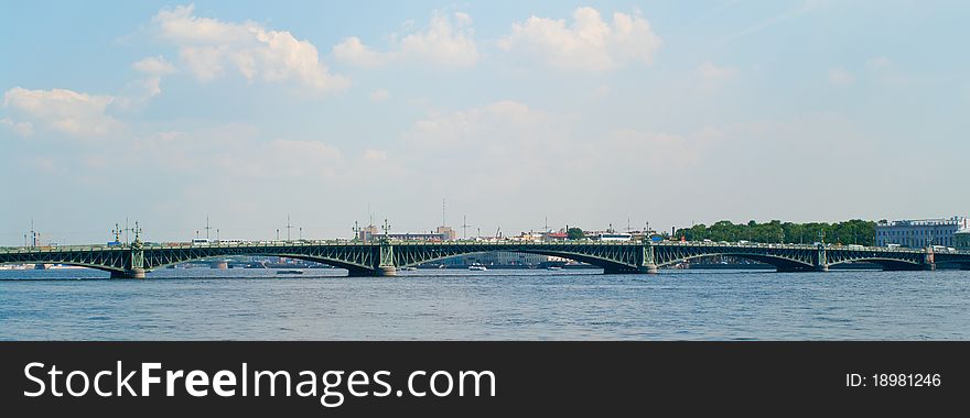 The urban landscape with bridge and river Neva. St.-Petersburg, Russia