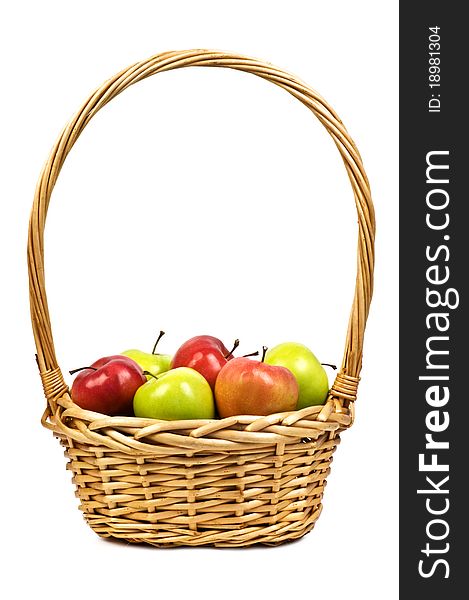 Basket with apples isolated on white