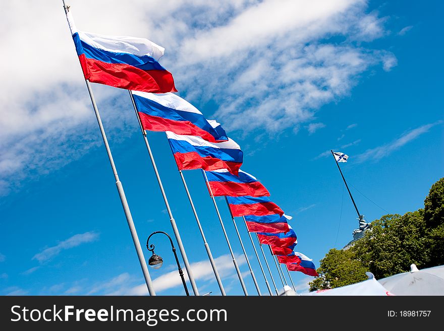 Line of the Russian flags flying in the wind