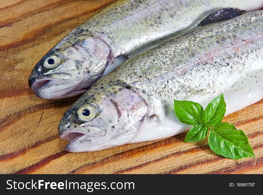 Fresh trout on wood table