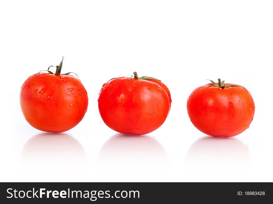 Red tomato vegetable fruits isolated on the white background