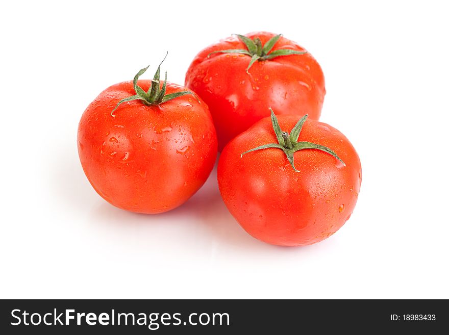 Red tomato vegetable fruits isolated on the white background