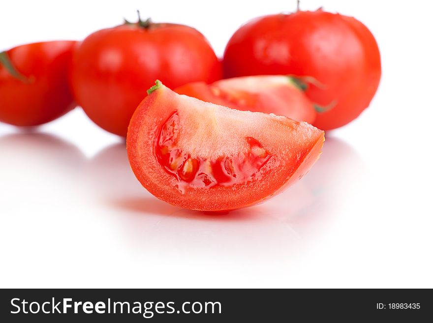 Red tomato vegetable fruits isolated on the white background
