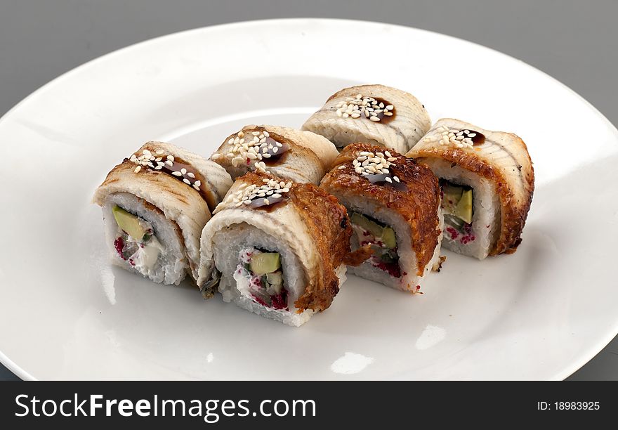 Six appetizer fresh sushi with eel. Six appetizer fresh sushi with eel