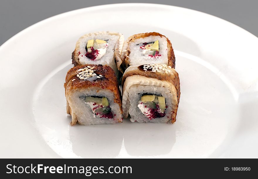 Four appetizer fresh sushi with eel. Four appetizer fresh sushi with eel