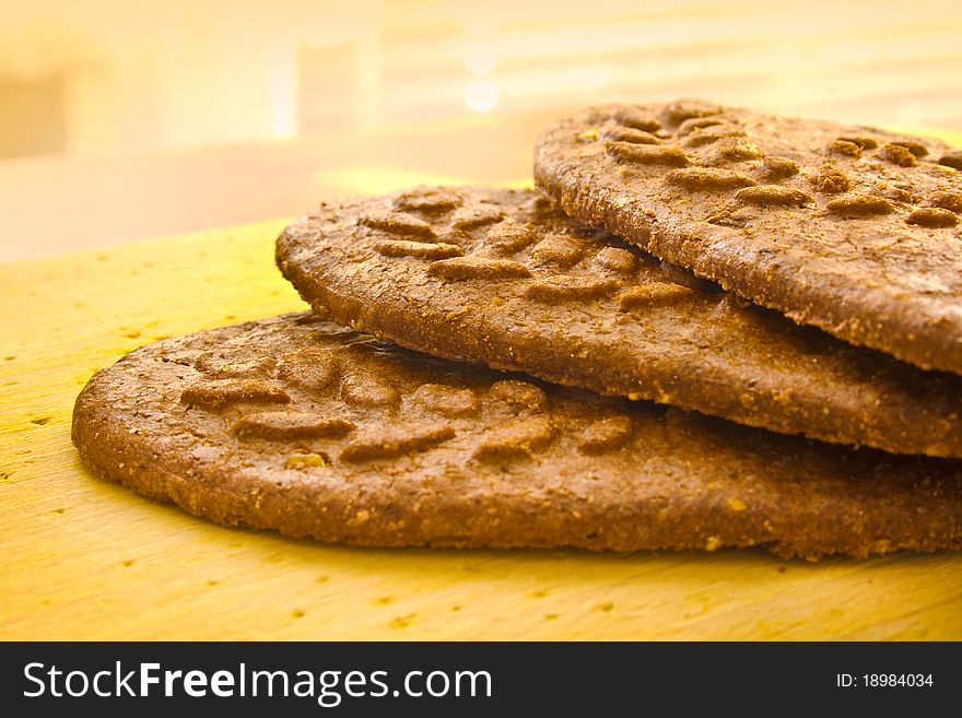 Three wholemeal cereal cookies with nuts and honey