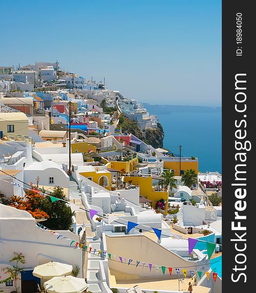 Classic view of Oia on island of Santorini in Greece. Traditional architecture with famous white houses. Classic view of Oia on island of Santorini in Greece. Traditional architecture with famous white houses.