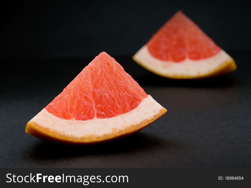 Slices of fresh delicious red grapefruit. Slices of fresh delicious red grapefruit