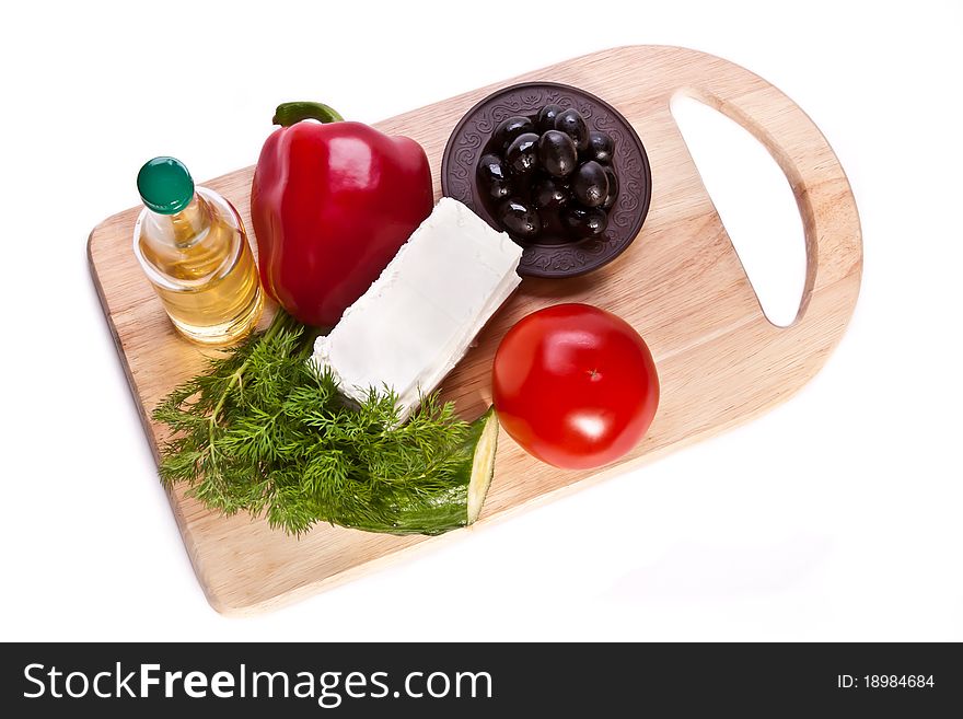 Fresh vegetables, cheese and oil for salad. Fresh vegetables, cheese and oil for salad