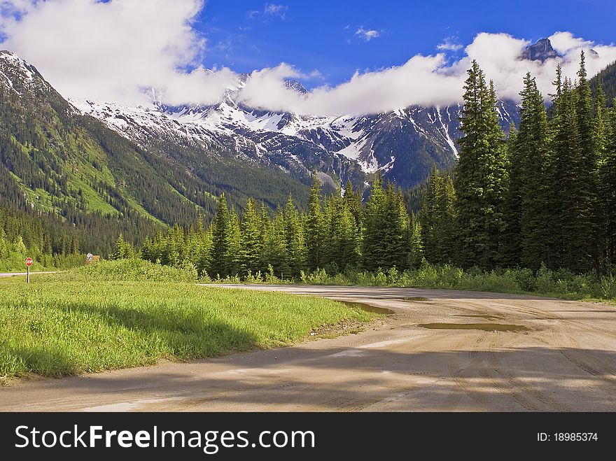 Cloud enshrouded mountains, at rogers pass, revelstoke national park.