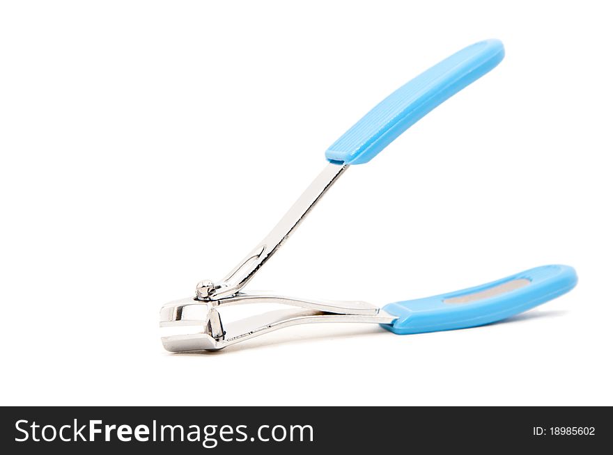 Close view detail of a nail clipper isolated on a white background.