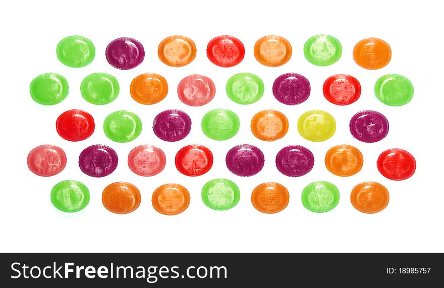 Assorted colorful candies isolated in white background