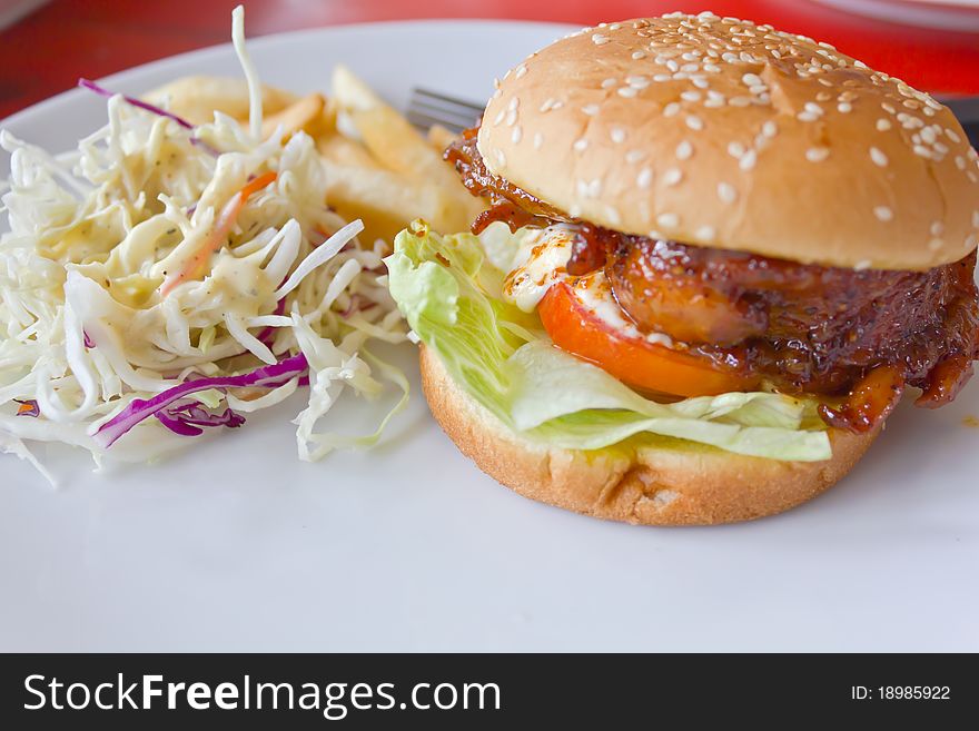 Chicken burger with tomato cucumber lettuce