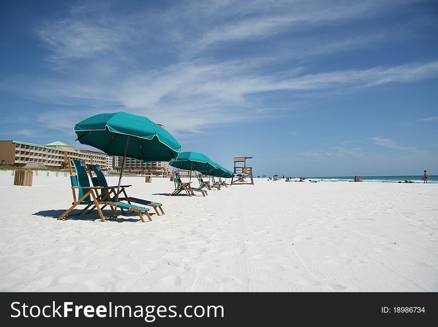 Beach chairs and a umbrellas. Beach chairs and a umbrellas.