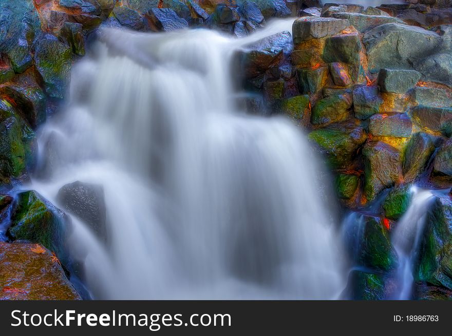 Beautiful picturesque waterfall in high dynamic range. Beautiful picturesque waterfall in high dynamic range.