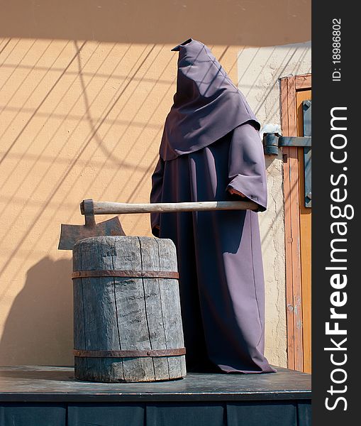 Executioner on a scaffold. Waxen figure. Shallow DOF