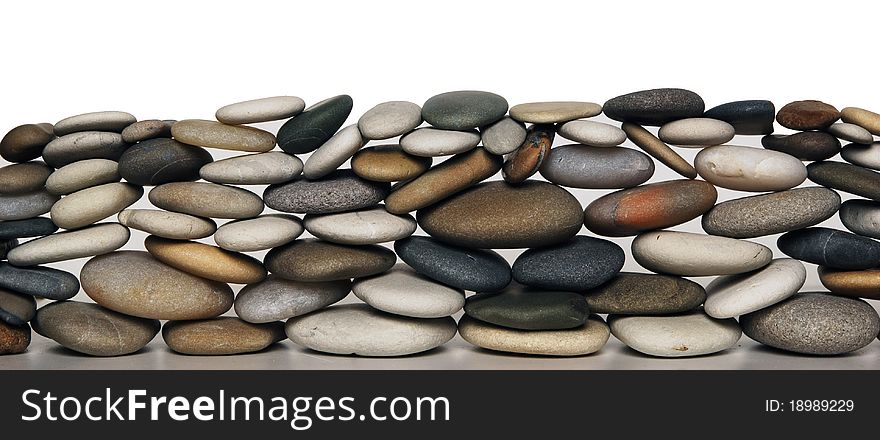 Round stones arranged on the floor