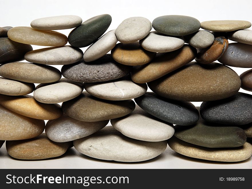 Round stones arranged on the floor