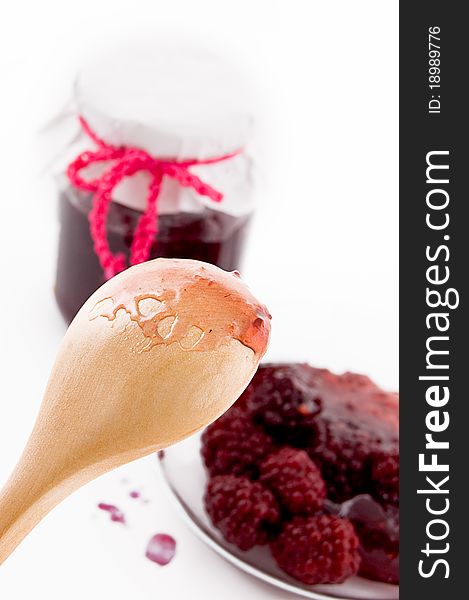 Spoon with blackberry jam