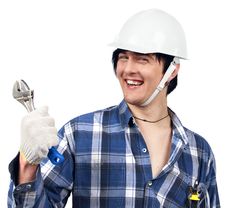 Young Worker Holding Spanner And Smiling Stock Photo Young Worker Holding Spanner And Smiling Stock Photo