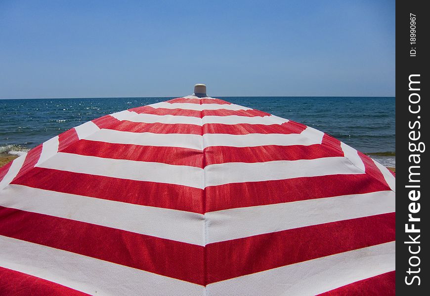 Summer on the beach with umbrella