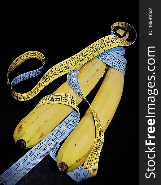 Banana diet concept with tape and measure