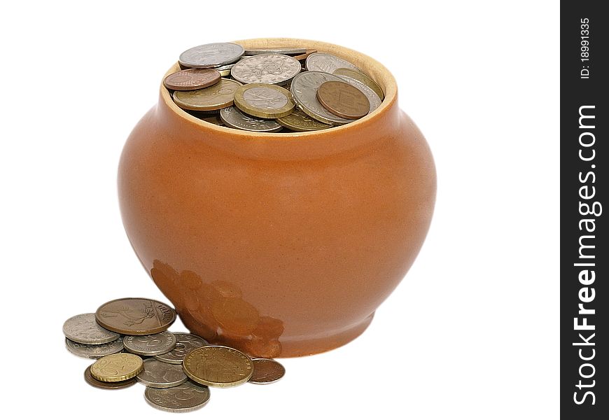 Old ceramic pot with metal money isolated on a white background. Old ceramic pot with metal money isolated on a white background.