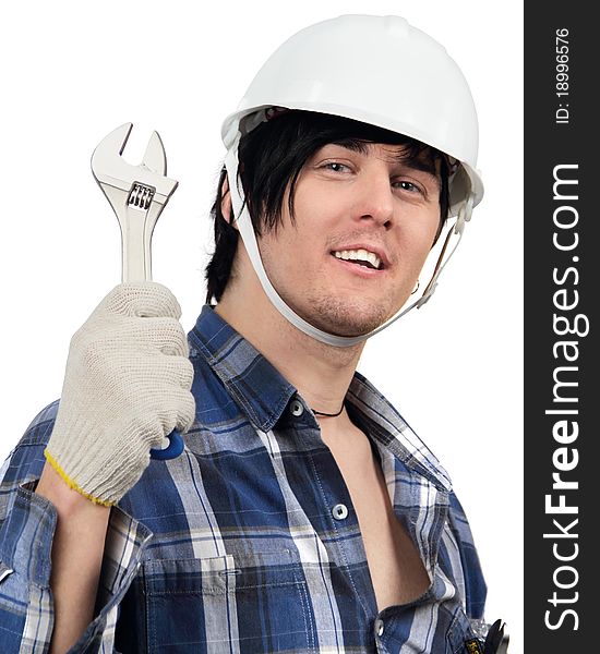 Cheerful worker with spanner in hand