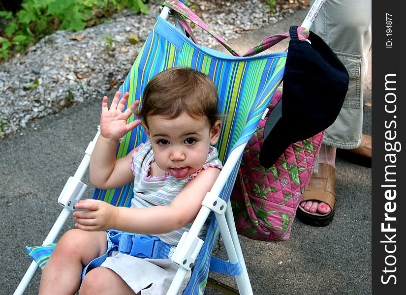 Cute baby girl with an attitude doing a raspberry with her tongue. Shot with a Canon 20D. Cute baby girl with an attitude doing a raspberry with her tongue. Shot with a Canon 20D.