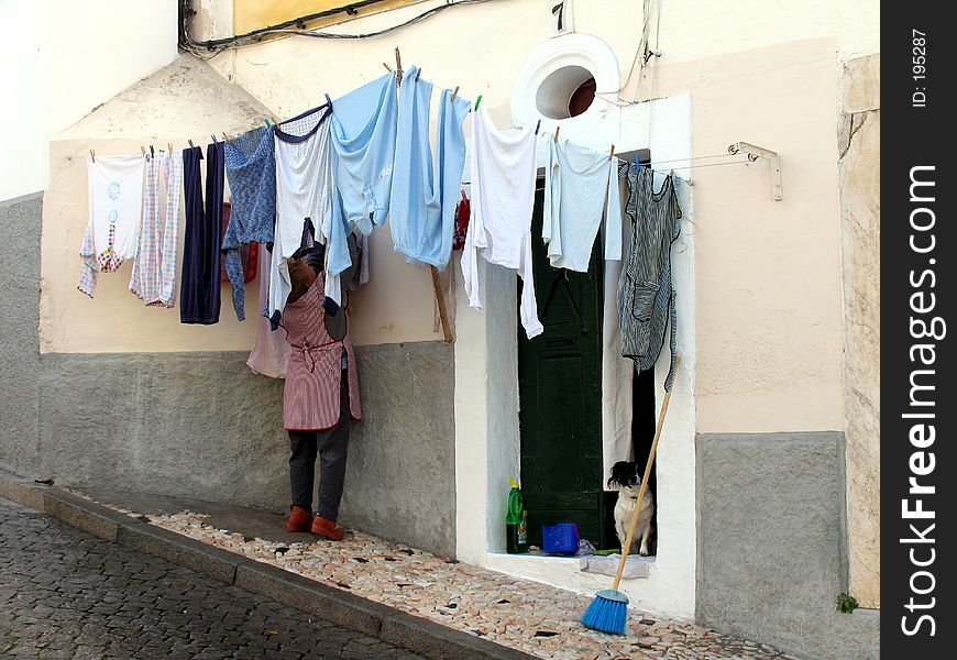 Putting clothes to dry out in the street. Putting clothes to dry out in the street