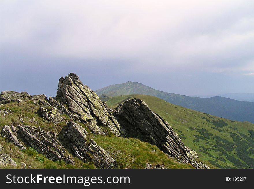 Carpathian mountains, Chernogora, Ukraine. Pip Ivan is visible afar. Carpathian mountains, Chernogora, Ukraine. Pip Ivan is visible afar.