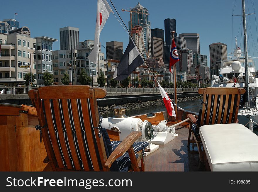 This is a picture from the deck of a classic yacht in Seattle, WA with the Seattle skyline ine the background. This is a picture from the deck of a classic yacht in Seattle, WA with the Seattle skyline ine the background.