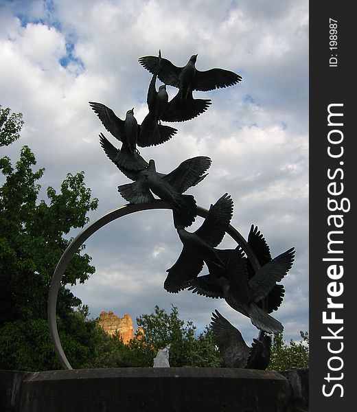 Doves in flight sculpture