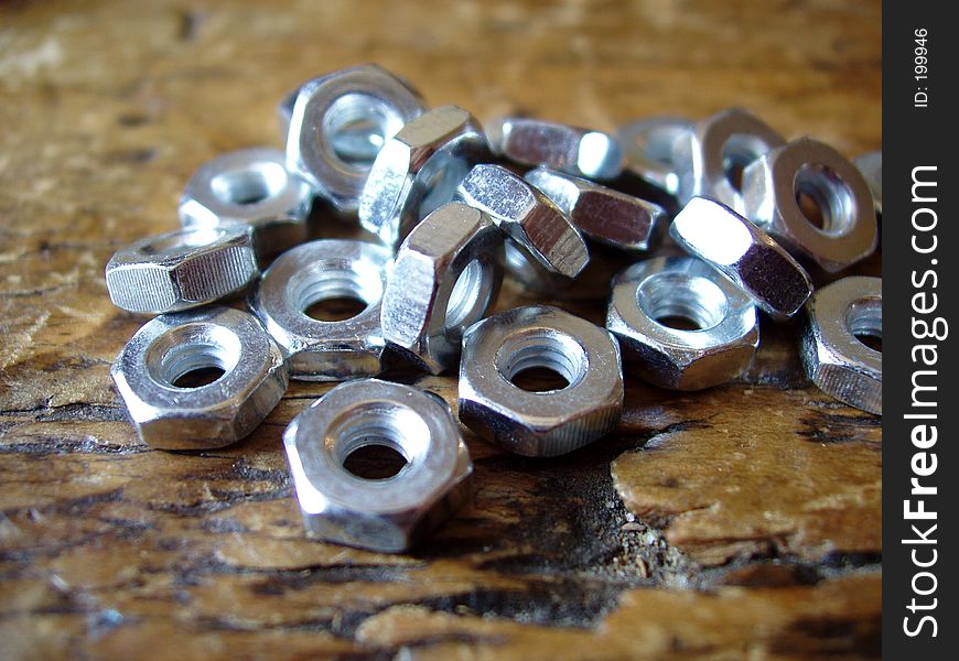 Hex nuts on wood
