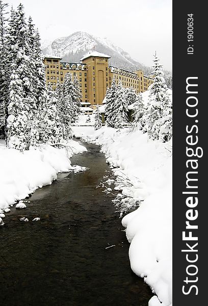 A river draining towards a secluded hotel