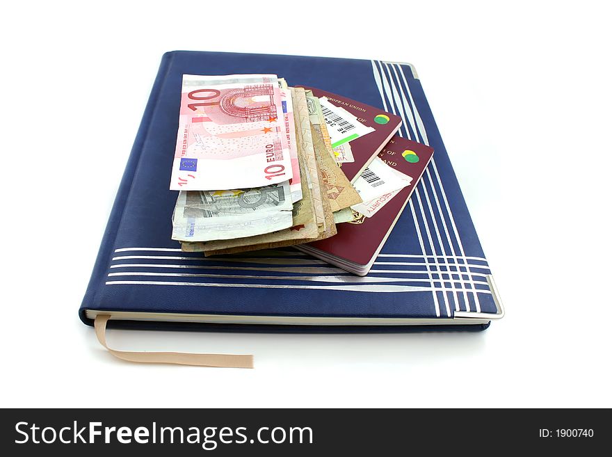 Diary book passport and Money on a white background. Diary book passport and Money on a white background