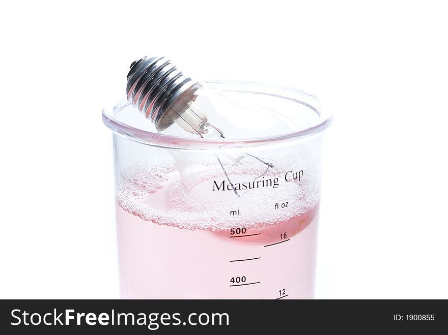 Measuring cup with liquid on white  background. Measuring cup with liquid on white  background