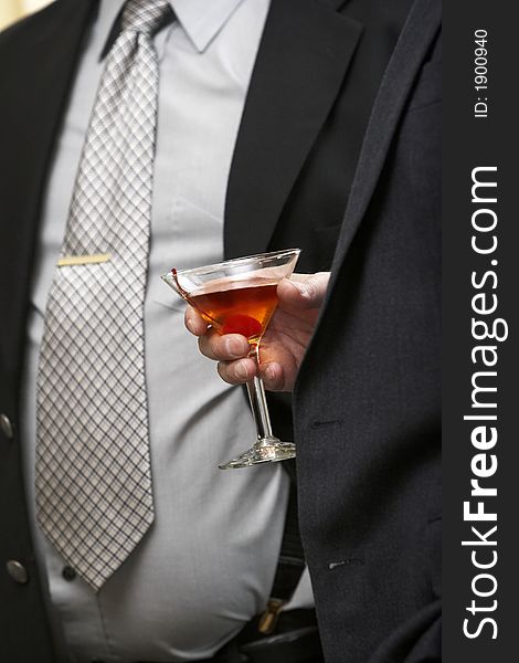 A martini being held by a man