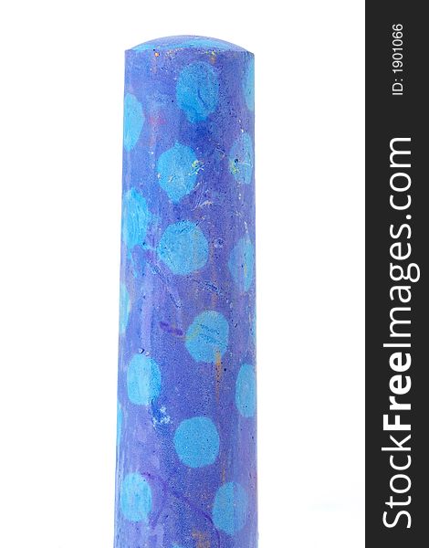 Single piece of blue polka dot chalk. Single piece of blue polka dot chalk