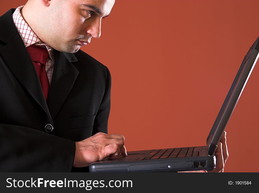 A Businessman using laptop computer