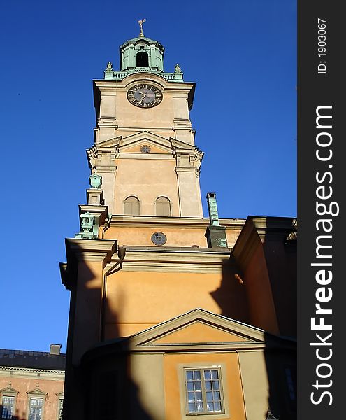 Clock-tower in old historical area of Stockholm