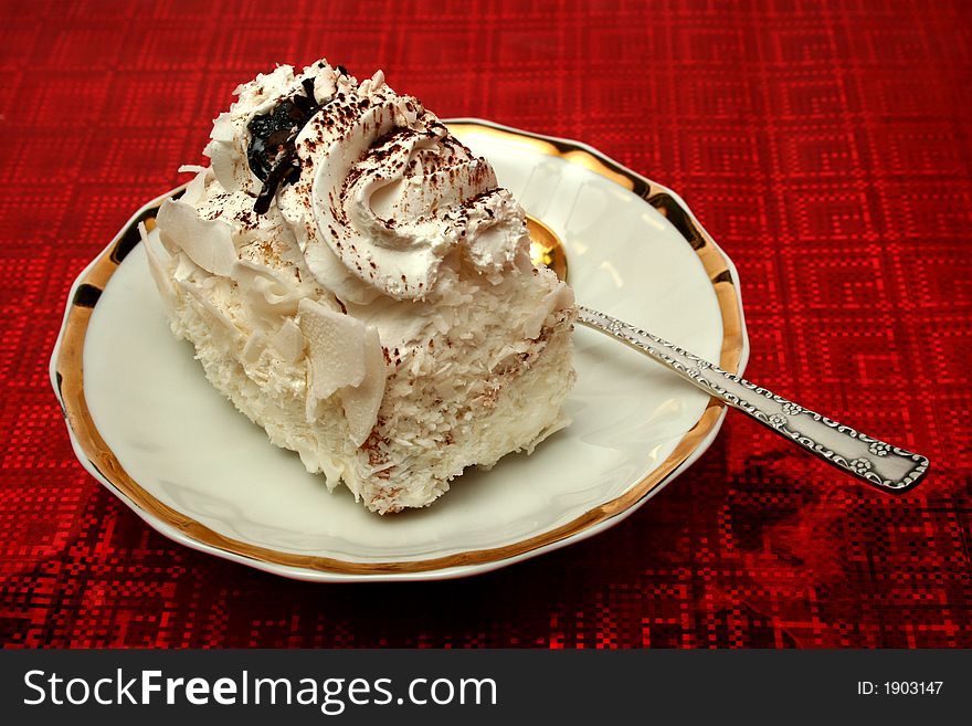 Slice Of A Pie With A Cream On A Red Background