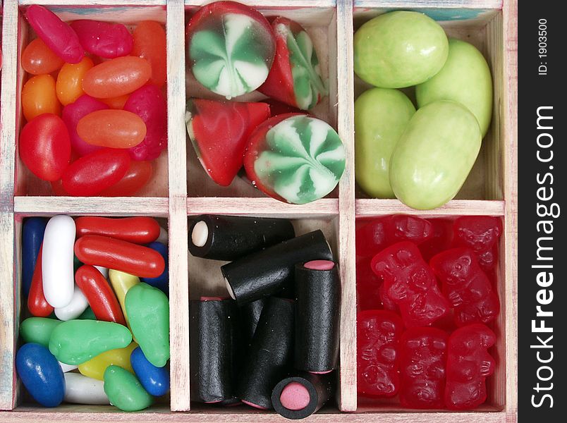 Assorted wooden box with colorful sweety candy