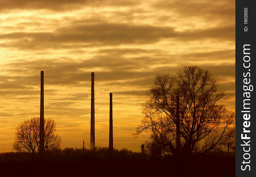 chimneys in sunset