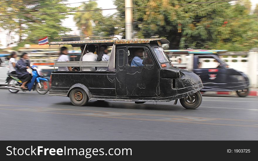 black tuk tuk   taxi on the road thailand