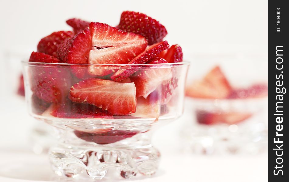 Clear bowl of fresh strawberries. Clear bowl of fresh strawberries.