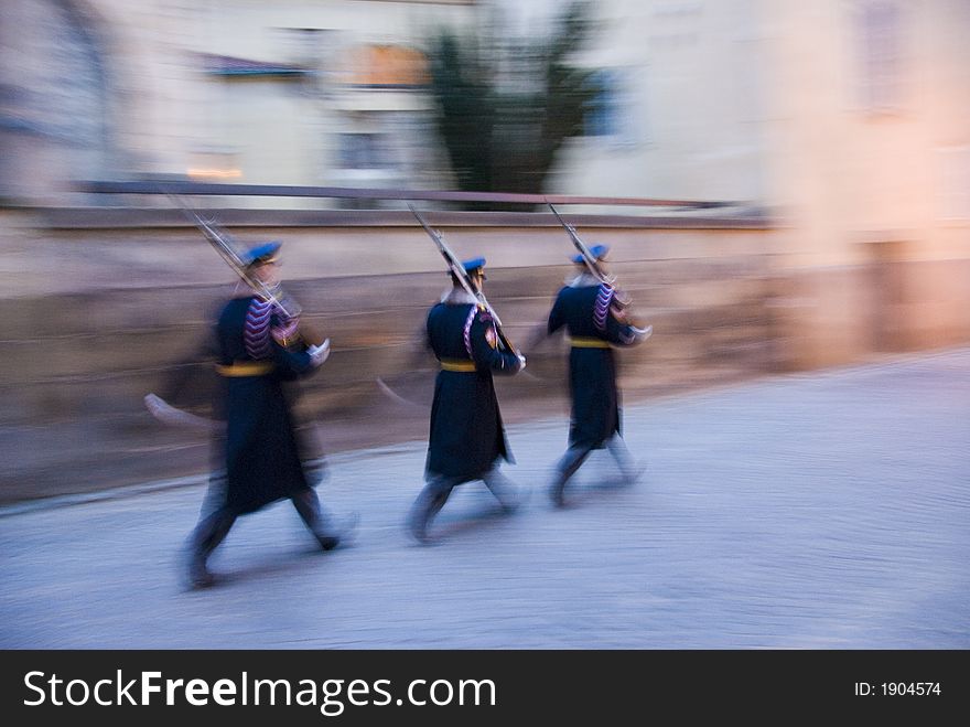 Czech soldiers marching while changing guards in Prague; motion blur